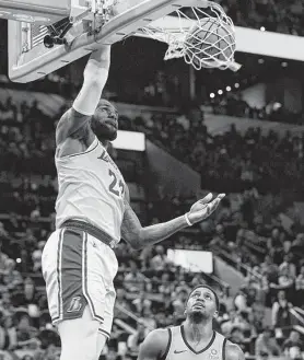  ?? Billy Calzada / Staff photograph­er ?? LeBron James put on a show Saturday night, with 35 points in the Lakers’ 110-106 loss to the Spurs. But he knows he’ll be on vacation in June.