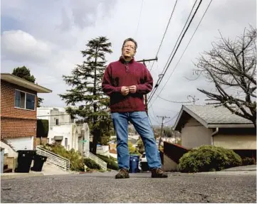  ?? Gina Ferazzi Los Angeles Times ?? SESSHU FOSTER in his Alhambra neighborho­od. He’s looking forward to teaching poetry this summer.