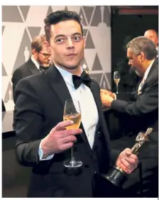  ??  ?? Don’t stop me now: Malek with his Best Actor award for ‘Bohemian Rhapsody’. — Reuters