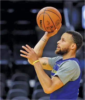  ?? AP PHOTO/JED JACOBSOHN ?? Golden State Warriors guard Stephen Curry practices Wednesday in San Francisco. The Warriors host the Boston Celtics on Thursday night in Game 1 of the NBA Finals.