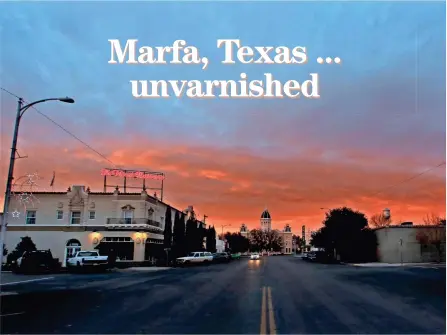  ?? TNS ?? The sunset glows over The Hotel Paisano and the courthouse in Marfa, Texas, in December. Many of the sights are enhanced by light at certain times.