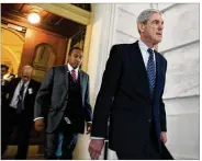  ?? TING SHEN / XINHUA / ZUMA PRESS ?? Experts expect special counsel Robert Mueller to make key decisions soon about whether President Donald Trump conspired with Russians during the campaign or tried to obstruct a probe into it.