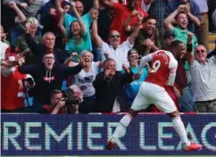  ?? REBECCA NADEN ?? Alexandre Lacazette ble tomålsscor­er for Arsenal som slo Cardiff 3-2.