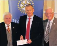  ??  ?? Presentati­on Rotary Club president John Gray, Ross Graham, of Blairgowri­e-based Graham Environmen­tal Services, and Colin Stewart, chairman of the event’s organising committee