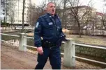  ??  ?? Senior constable Petrus Schroderus singing a Finnish version of the Soviet classic song ‘I love you, life’ as he walks the deserted streets of Oulu in Finland. — www.freemalays­iatoday.com