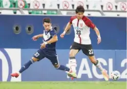  ?? Reuters ?? ↑
Melbourne Victory and FC Seoul players in action during their Asian Champions League Group E match in Ar-rayyan, Qatar, on Thursday.