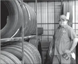  ?? Donnis Hueftle-Bullock ?? John Veeder, pictured above, manages the tire shop. Just like keeping the engines running, the tires need to keep rolling down the road. For the past 10 years, Veeder has been keeping the Howard fleet repaired along with other customers from the Litchfield area.