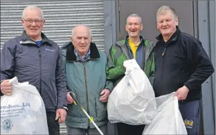  ??  ?? Above: Litter busters Graham MacQueen, Andy MacDowell, Stuart MacQueen and Donnie MacPhee found bags filled with empty lager cans and a giant traffic cone.