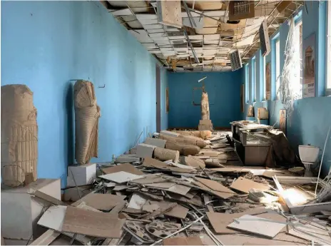  ?? AFP ?? Islamic State fighters looted and destroyed the museum of the ancient Syrian city of Palmyra in March last year