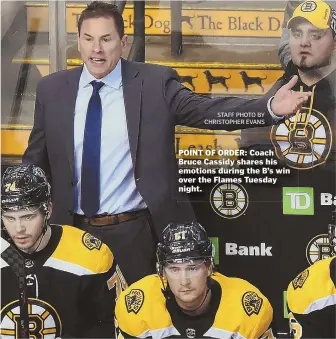 ?? STAFF PHOTO BY CHRISTOPHE­R EVANS ?? POINT OF ORDER: Coach Bruce Cassidy shares his emotions during the B’s win over the Flames Tuesday night.