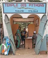  ??  ?? Tourists arrive to visit the Pythons Temple in the small coastal town of Ouidah, some 40km from Benin's capital Cotonou.