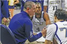  ?? STAFF FILE PHOTO BY OLIVIA ROSS ?? UTC men’s basketball coach Dan Earl will be entering his third season with the Mocs in 2024-25, and the loss of players to graduation and the transfer portal means he and his staff have some gaps to fill before tipping off again.