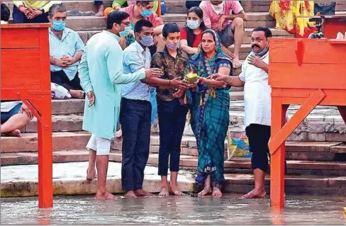  ?? AFP ?? Pilgrims are returning to Haridwar, one of Hinduisim’s holiest places, since India lifted its Covid-19 lockdown.