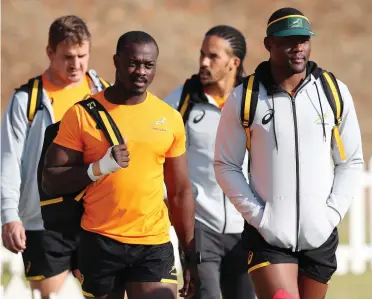  ??  ?? PRIMED FOR LOFTUS: New cap Raymond Rhule, in orange t-shirt, and Oupa Mohoje with teammates at a practice session ahead of the first Test against France in Pretoria.