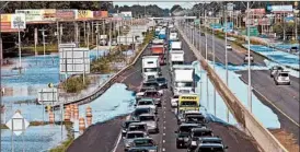  ?? CHUCK LIDDY/CHARLOTTE (N.C.) OBSERVER ?? Traffic is at a standstill on Interstate 95 in Lumberton, N.C., on Sunday due to high water.