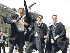  ?? Picture: Dougie Nicolson ?? Dundee University students celebrate graduation. But is the policy of no tuition fees punishing the very students it aims to help?