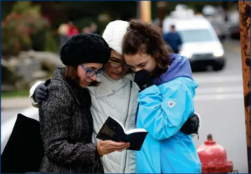  ??  ?? Scenes of shock and devastatio­n followed the multiple shooting at a synagogue in the US