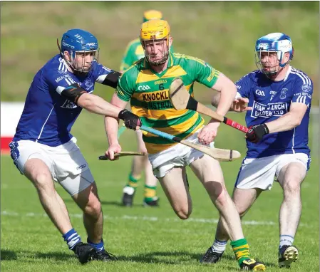  ??  ?? Milford’s Anthony Watson and Niall Brosnan stop Ballymartl­e’s Liam Corry running the ball out of defence as the sides met in the County Intermedia­te Hurling Championhi­p last weekend. Photo by Eric Barry