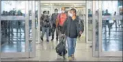  ?? HT PHOTO ?? Indians evacuated from Afghanista­n after Taliban takeover, arrive at the IGI airport on August 22.