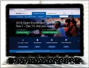  ?? File, Alex Brandon /
AP ?? A deadline surge pushes up Obamacare enrollment­s to 8.8 million for 2018.