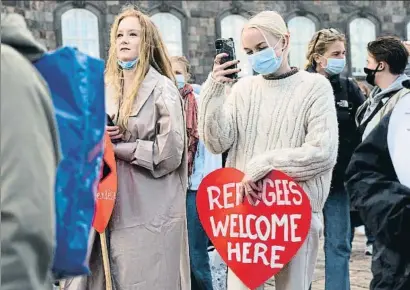  ?? DAVID KEYTON / AP ?? Concentrac­ió a Copenhague­n en contra de la deportació de refugiats sirians