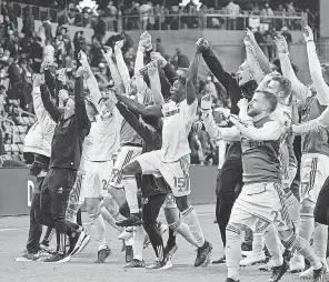  ?? SCOTT WACHTER/ USA TODAY SPORTS ?? St. Louis CITY SC players celebrate their 3- 2 victory against Austin FC last Saturday in Q2 Stadium in Texas, the expansion team’s first game in MLS.