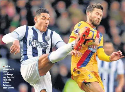  ??  ?? >
Jake Livermore (left), challengin­g Crystal Palace’s Yohan Cabaye, cost £10m