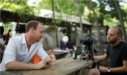  ??  ?? ACTIVIST JONATHAN WHITLAM (right) interviews British citizen Rob, who lives in Berlin, last week.