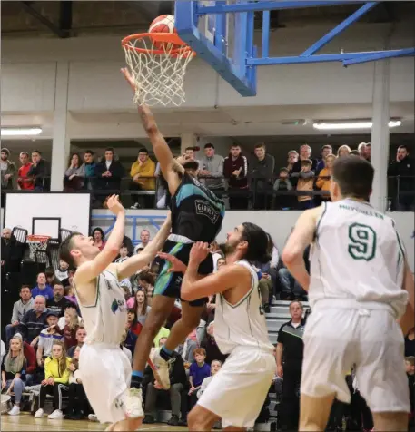  ?? Jonathan Lawton gets to the basket for Tralee Warriors against Moycullen ??