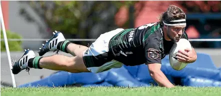  ?? GETTY IMAGES ?? Above: South Canterbury No 8 Ryan McNab scores a try on debut, against Buller in the Lochore Cup semifinal match. Below: South Canterbury halfback Theo Davidson during the Heartland Championsh­ip semifinal in Westport.