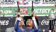  ?? LARRY PAPKE / ASSOCIATED PRESS ?? Kyle Larson (5) celebrates after winning a NASCAR Cup Series auto race at Texas Motor Speedway Sunday in Fort Worth, Texas.