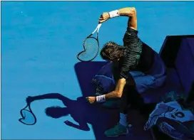  ?? QUINN ROONEY / GETTY IMAGES ?? Alexander Zverev smashes his racket during his fourth-round Australian Open loss to Milos Raonic. In the first week of the tournament, Naomi Osaka, Dominic Thiem, Ryan Harrison and Daniil Medvedev also smashed rackets.