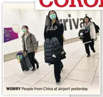  ??  ?? WORRY People from China at airport