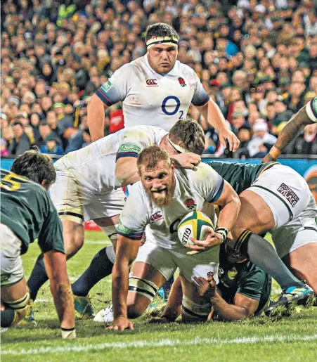  ??  ?? Falling short: Flanker Brad Shields fails to make it to the try-line in his first start for England