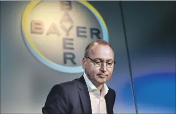  ?? Martin Meissner Associated Press ?? GETTING PAST the legal drama has been a top priority for Bayer CEO Werner Baumann, shown in Leverkusen, Germany, in February. The company says there are still about 30,000 cases yet to be settled.