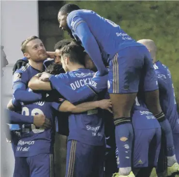  ??  ?? CELEBRATIN­G: FC Halifax Town go into the new year with hopes of finishing in the play-offs.