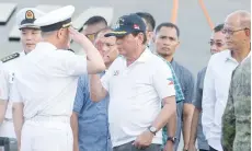  ?? — AFP ?? Philippine President Rodrigo Duterte visits the Chinese guided missile frigate Changchun berthed at the Davao internatio­nal port on Monday.