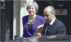  ??  ?? Prime Minister Theresa May leaves 10 Downing Street for the weekly Prime Minister’s Question session in the House of Commons in London on Wednesday. — AFP