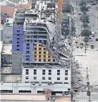  ?? GERALD HERBERT/ AP ?? The Hard Rock Hotel in New Orleans was under constructi­on when part of it collapsed Saturday.