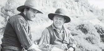  ?? THE CANADIAN PRESS ?? Joaquin Phoenix, left, and John C. Reilly star in the film adaptation of Patrick deWitt’s award-winning novel, "The Sisters Brothers," a dark comic Western about two brothers who are assassins.