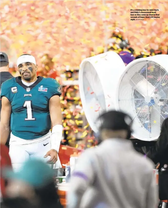  ?? AP PHOTOS ?? It’s a crushing loss for Jalen Hurts and Philly’s cheesestea­k-head fans as they come up short in final seconds of Super Bowl LVII Sunday night.