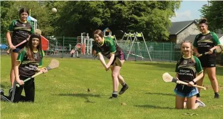  ??  ?? Caoimhe Murphy enjoys the support of Sheilagh Jessica Gilbourne, Muireann Cronin, Clara O’Leary and Clara O’Keeffe during the Millstreet Camogie Club Puck for Pieta Fundraiser. Picture John Tarrant