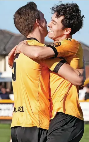  ?? Karl Dunkerley ?? ● Niall Watson, right, celebrates his goal with Adam Anson after opening the scoring against York on Saturday