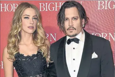  ?? JORDAN STRAUSS / AP ?? Amber Heard y Johnny Depp se conocieron en el 2011 y se casaron en febrero del 2015