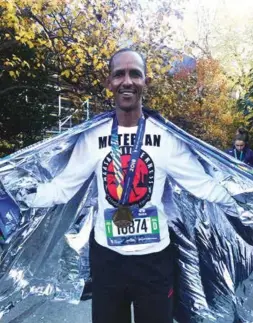  ??  ?? LEFT: The 2018 MWCT Maasai Runner, Muterian Ntanin, after finishing the NYC Marathon.