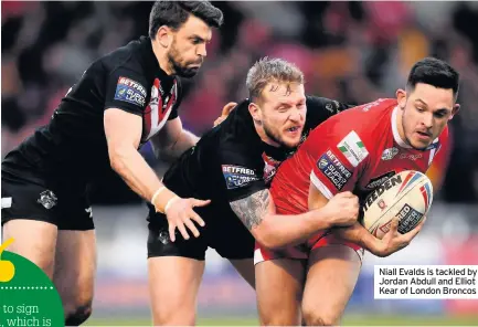  ??  ?? Niall Evalds is tackled by Jordan Abdull and Elliot Kear of London Broncos