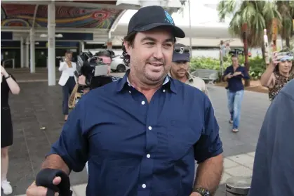  ?? Photograph: Aaron Bunch/AAP ?? Matt Wright of TV’s Outback Wrangler arrives at Darwin airport before handing himself in at a Northern Territory police station.