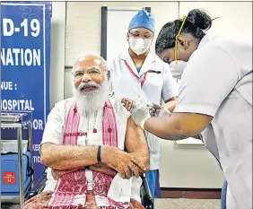  ?? PTI ?? Prime Minister Narendra Modi received his first dose of the Covaxin vaccine at AIIMS in New Delhi on Monday.