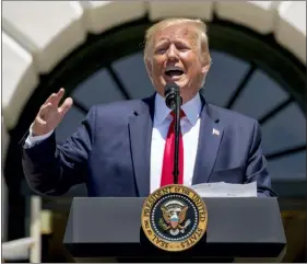  ?? ANDREW HARNIK — THE ASSOCIATED PRESS ?? President Donald Trump speaks during a Made in America showcase on the South Lawn of the White House in Washington, Monday.