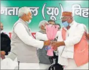  ?? HT ?? Bihar CM Nitish Kumar greets newly elected JD (U) state president Umesh Kushwaha, at party office in Patna Sunday.